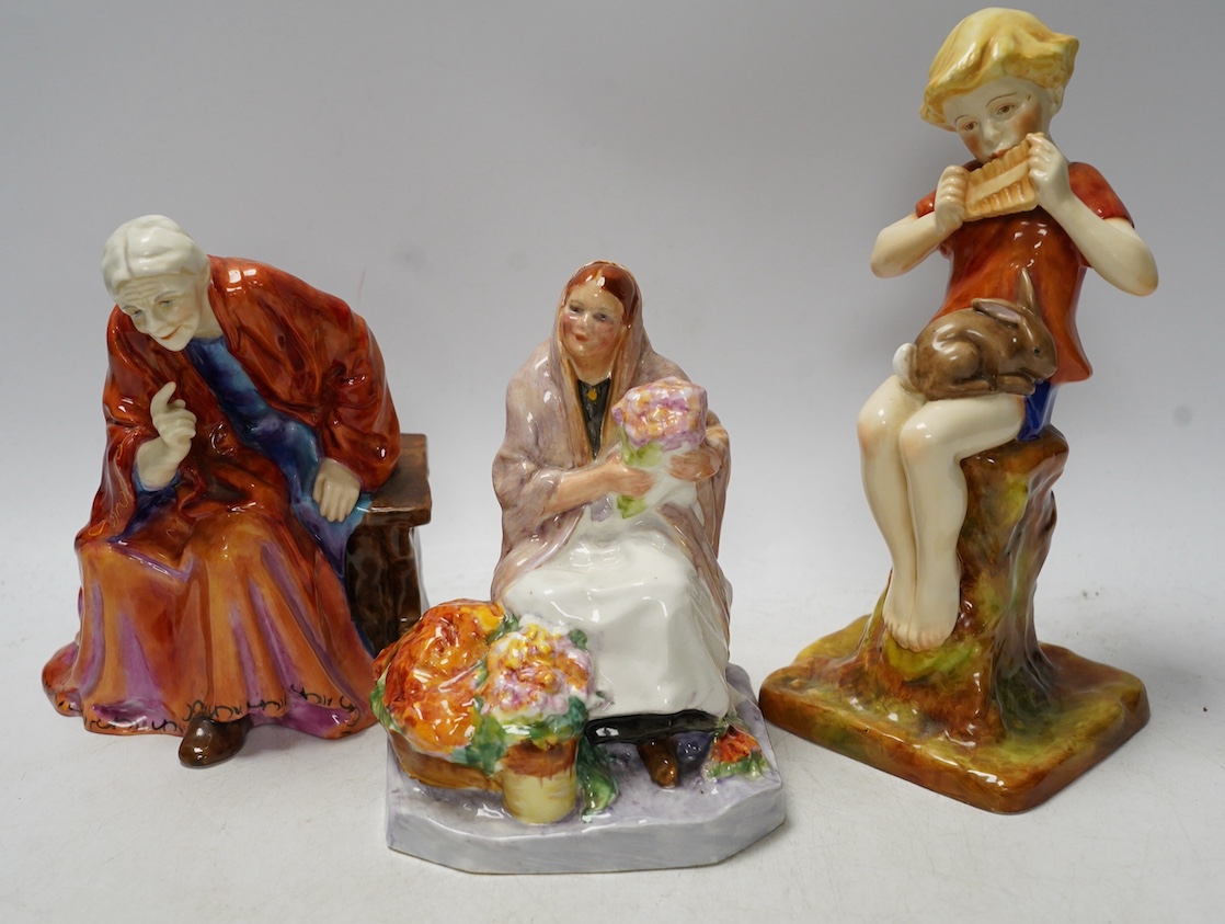 Three Worcester figurines comprising 'Dublin Flower Girl', The Fortune Teller and Peter Pan, tallest 20cm high. Condition - good